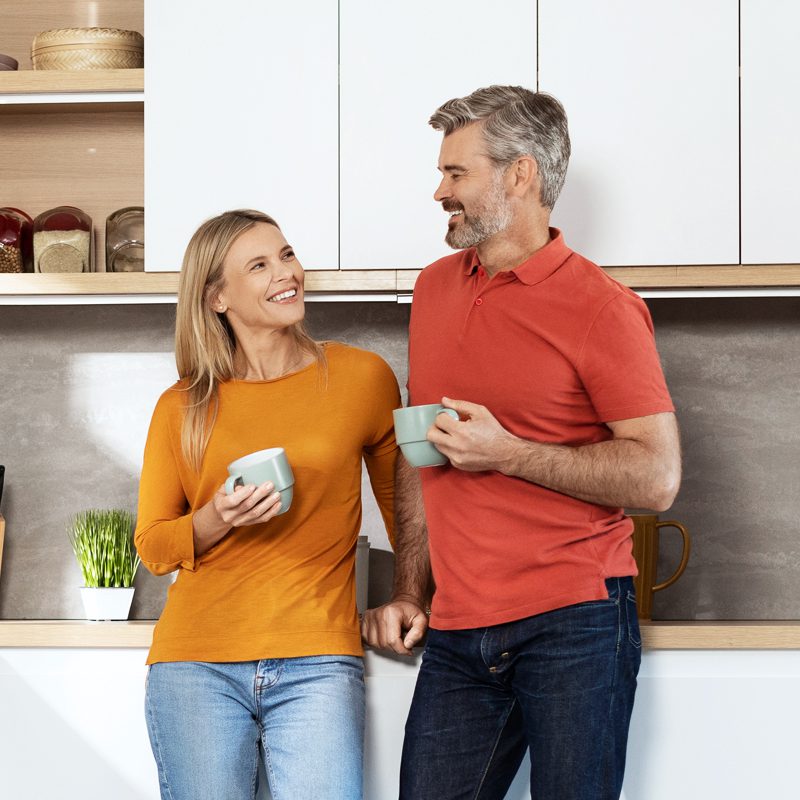 Parker-Heating-and-Air-Conditioning-couple-drinking-coffee-in-warm-kitchen