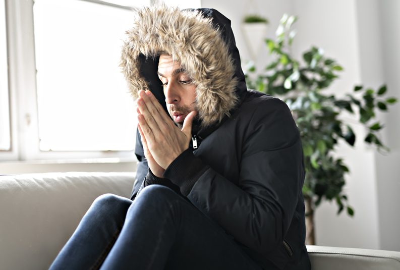 Parker-Heating-and-Air-Conditioning-man-wearing-parka-in-house